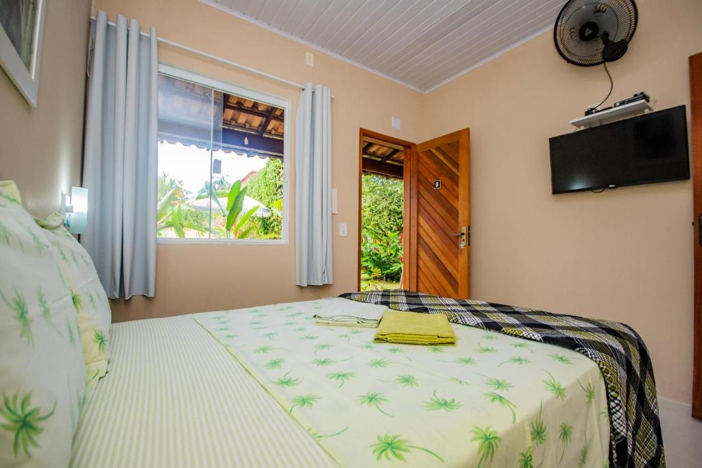TV a/nebo společenská místnost v ubytování Pousada Quatro Estações Paraty