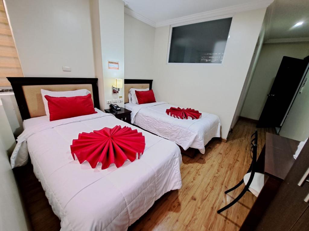 Postel nebo postele na pokoji v ubytování Hotel Loja Bella