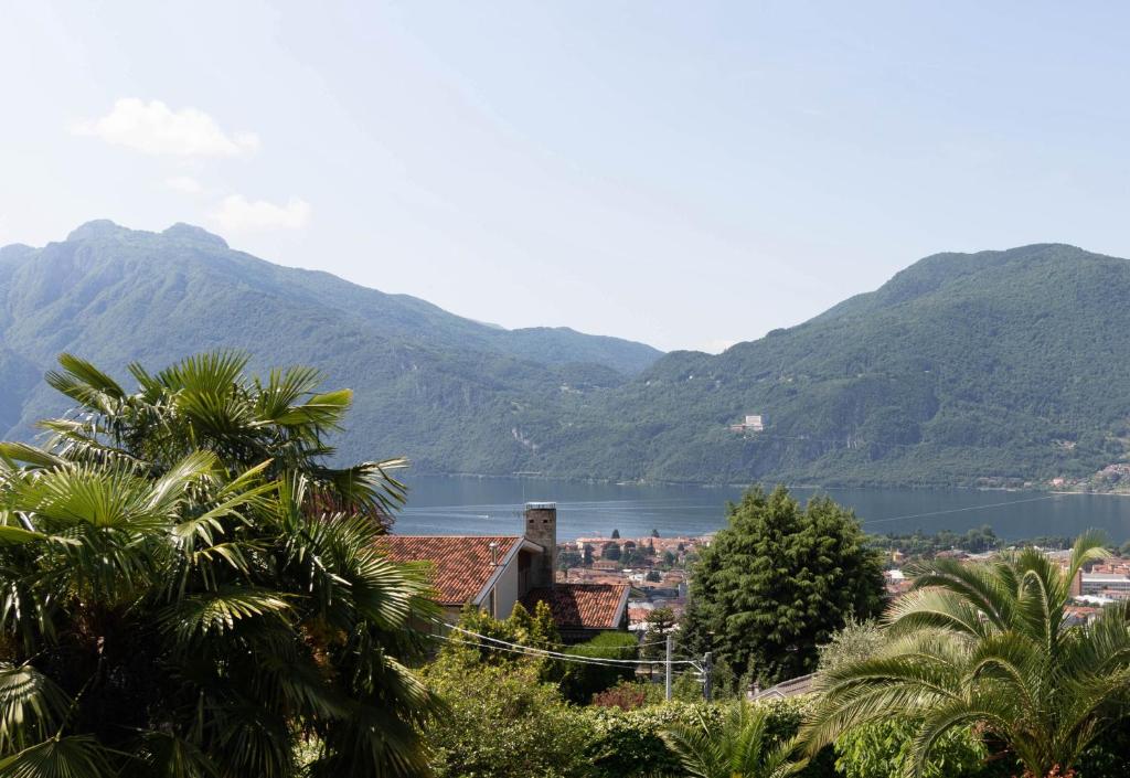 a view of a body of water with mountains at Mamma Ciccia Holiday Home - Mountains & Lake in Mandello del Lario
