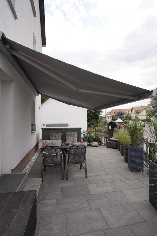 Balkón nebo terasa v ubytování Ferienwohnung am Cospudener See