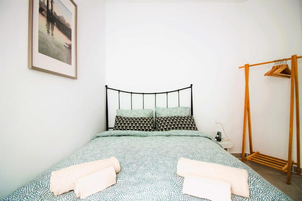 Postel nebo postele na pokoji v ubytování Casa Tabaiba con jardín y barbacoa