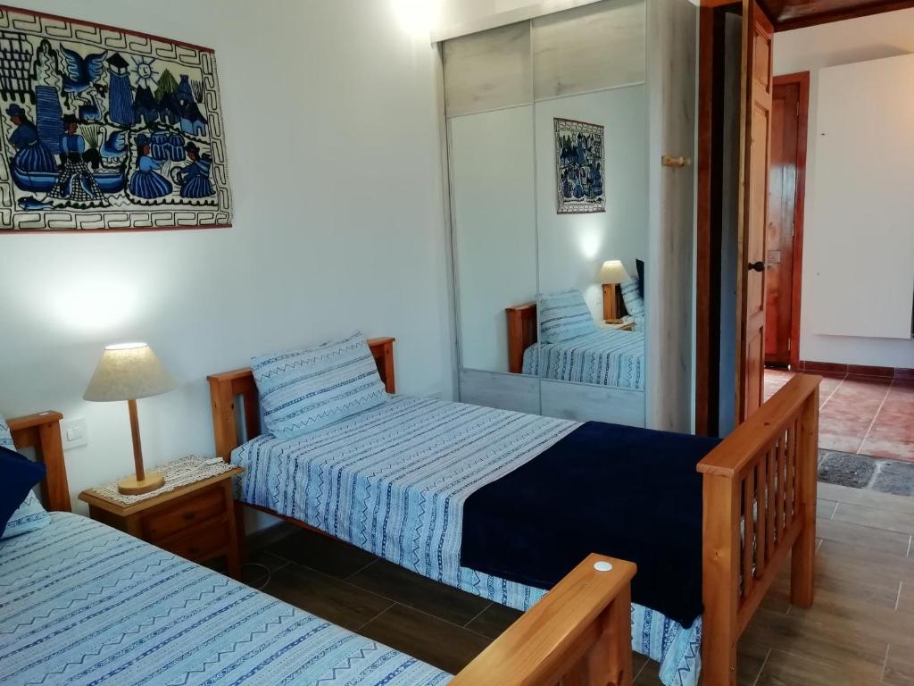 En eller flere senge i et værelse på Finca Las Tapias, Casa Mañé