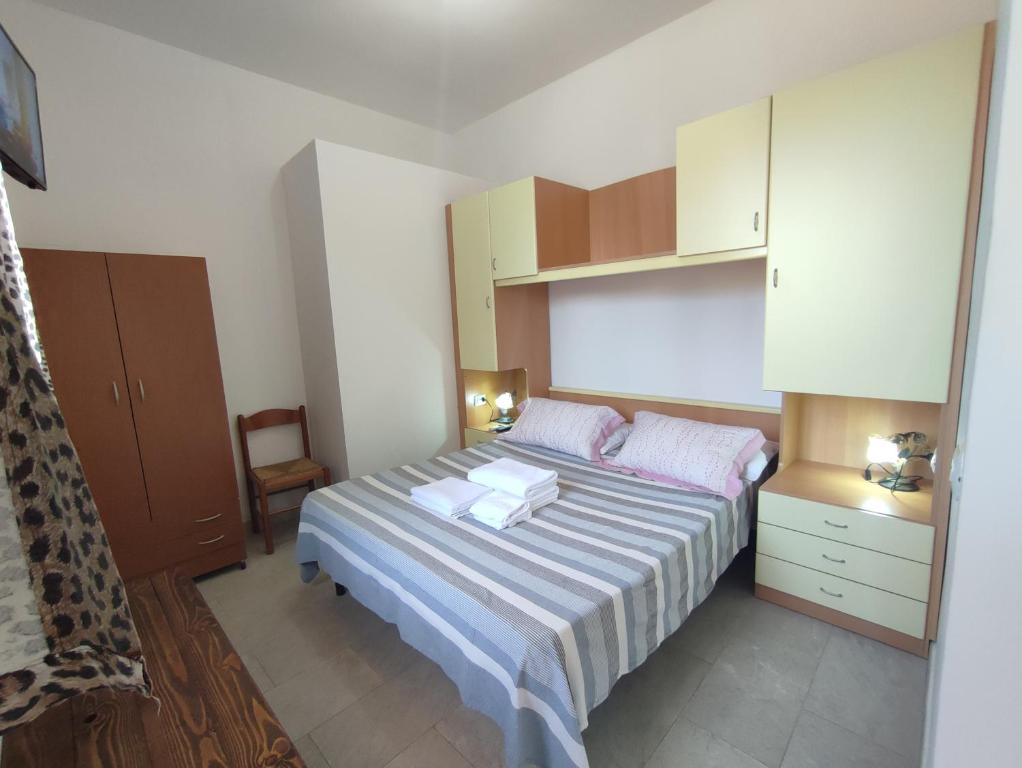 Postel nebo postele na pokoji v ubytování B&B Villa Nicoletta