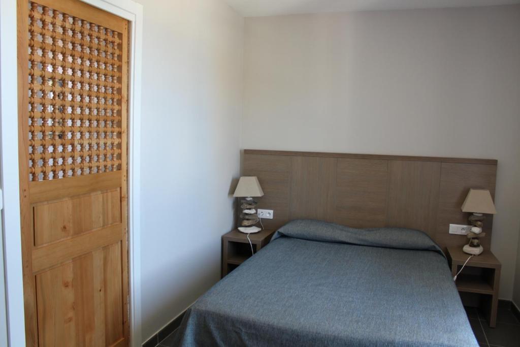Postel nebo postele na pokoji v ubytování Hotel St Joseph