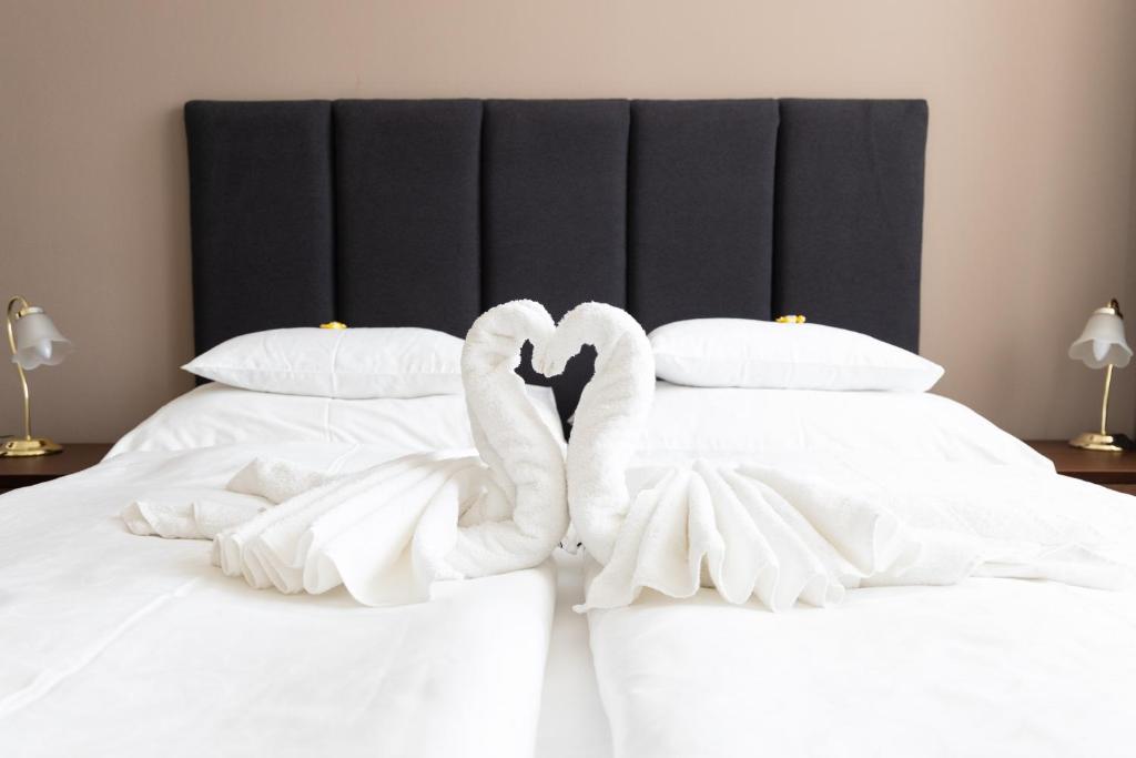Posteľ alebo postele v izbe v ubytovaní Hotel Polana