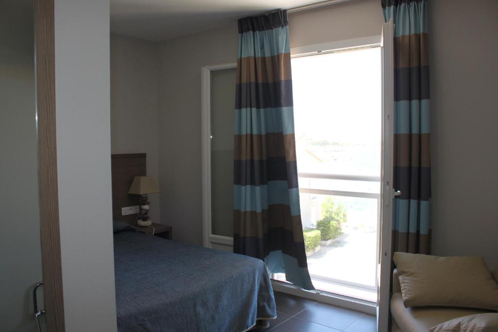Postel nebo postele na pokoji v ubytování Hotel St Joseph