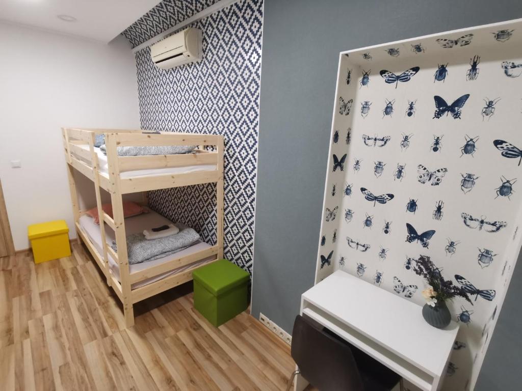 Postel nebo postele na pokoji v ubytování Tiki Taka Hostel & Pub