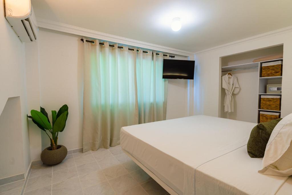 TV a/nebo společenská místnost v ubytování Hotel Cocoliso Island Resort