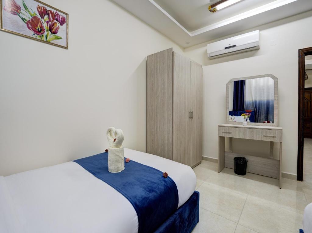Postel nebo postele na pokoji v ubytování ENG-Murjan Apartment