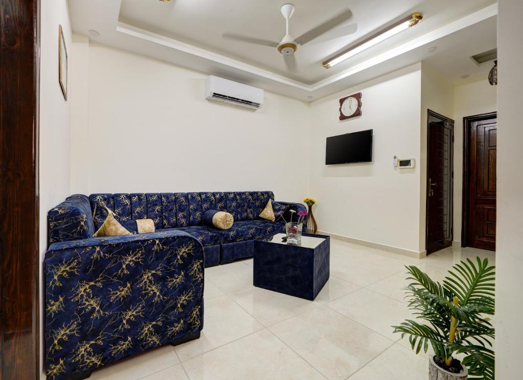 TV a/nebo společenská místnost v ubytování ENG-Murjan Apartment