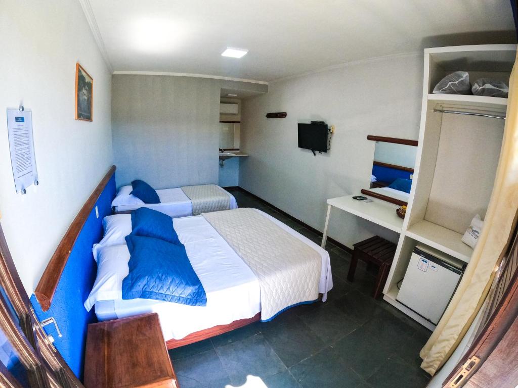 Postel nebo postele na pokoji v ubytování Pousada A Pérola