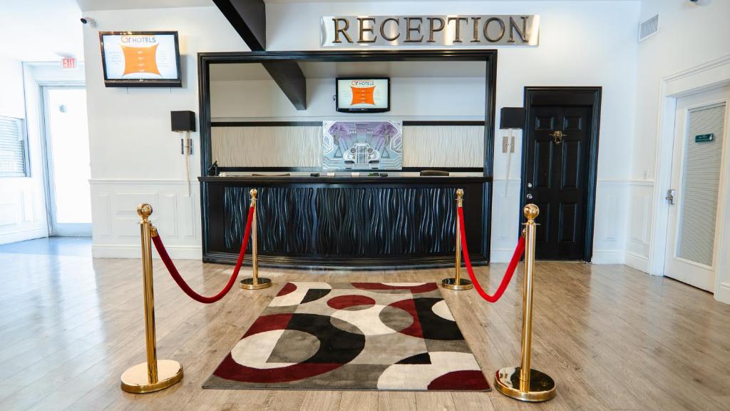 Lobbyen eller receptionen på G T Hotels Inn & Suites Extended Stay