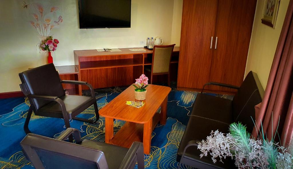 TV a/nebo společenská místnost v ubytování 456 Hotel