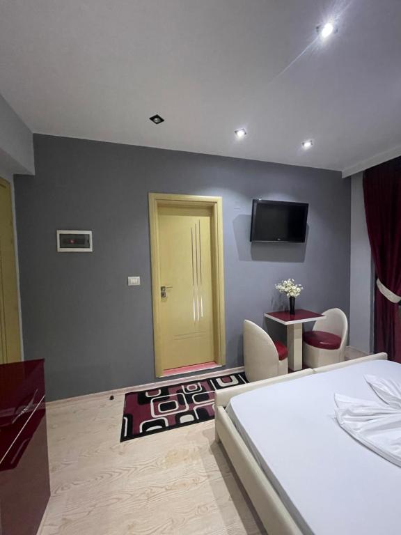 Postel nebo postele na pokoji v ubytování Hotel Selfo