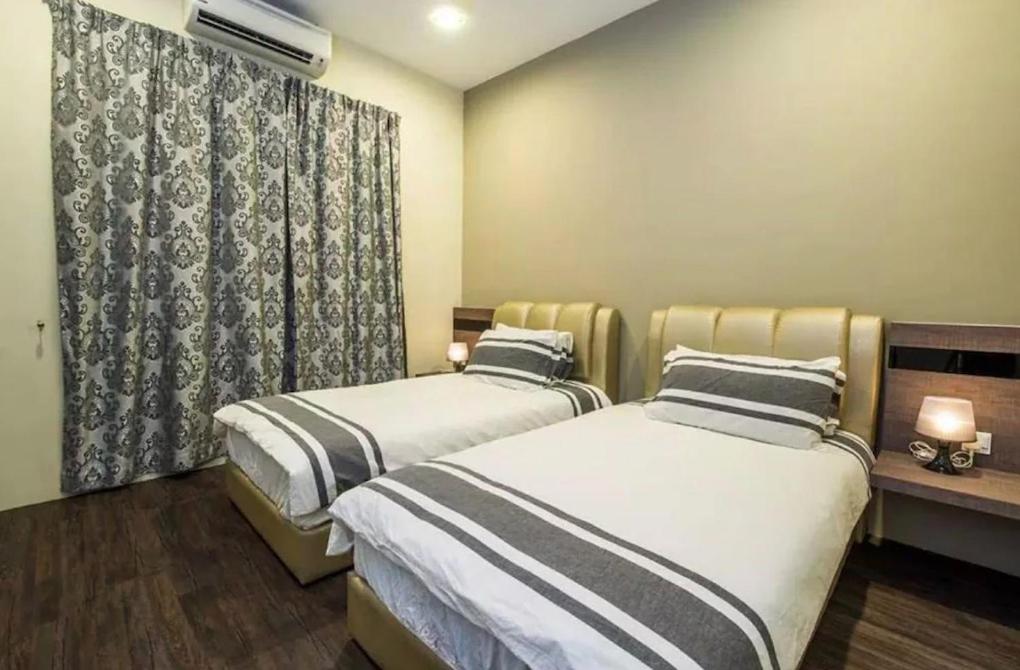 Postel nebo postele na pokoji v ubytování Mbp Leisure Resort