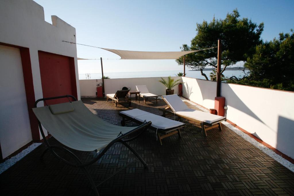 Balkón nebo terasa v ubytování SEVEN Hostal