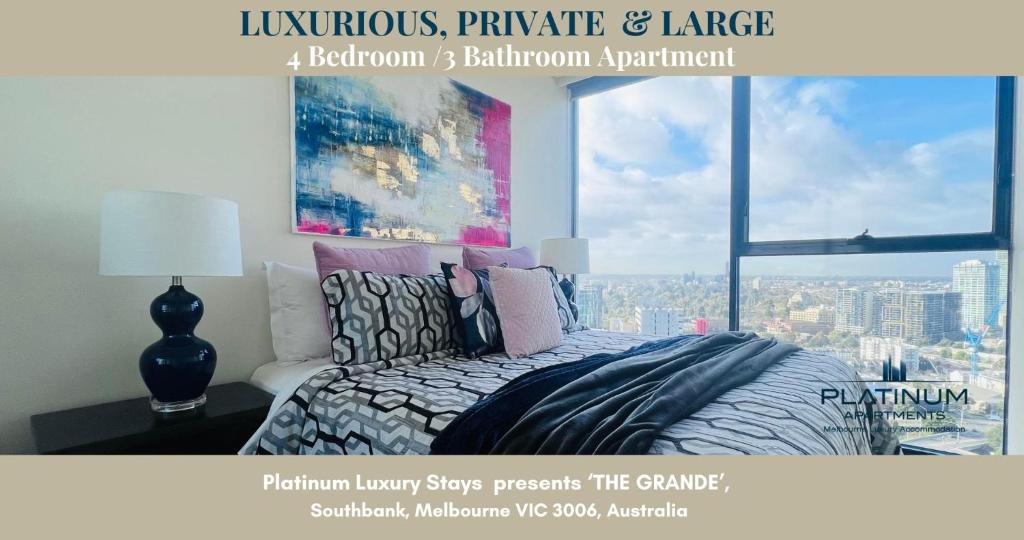 a bedroom with a bed with a large window at Platinum Luxury Stays The Grande Large 4 BRM 3 Bath Apt in Melbourne