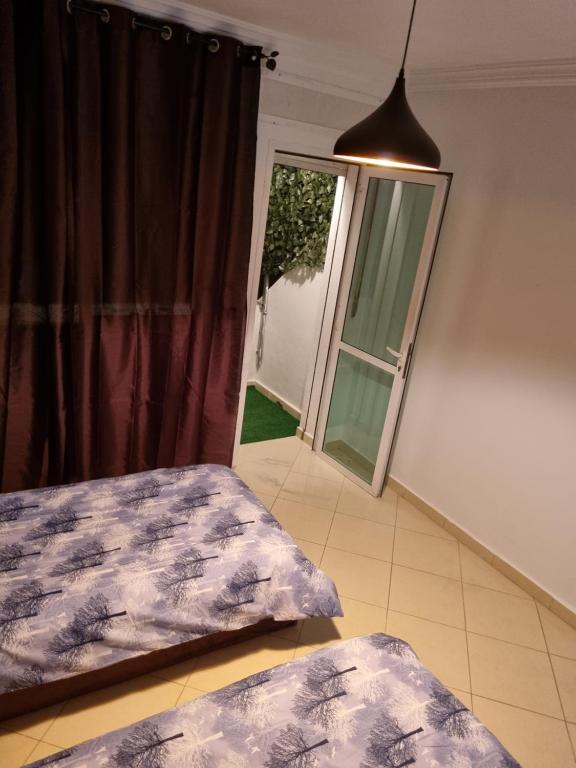Postel nebo postele na pokoji v ubytování El jardín de Miramar