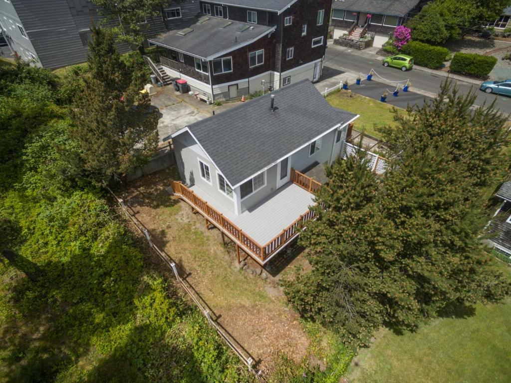 an aerial view of a large house with a porch at Seaside Prom in Seaside