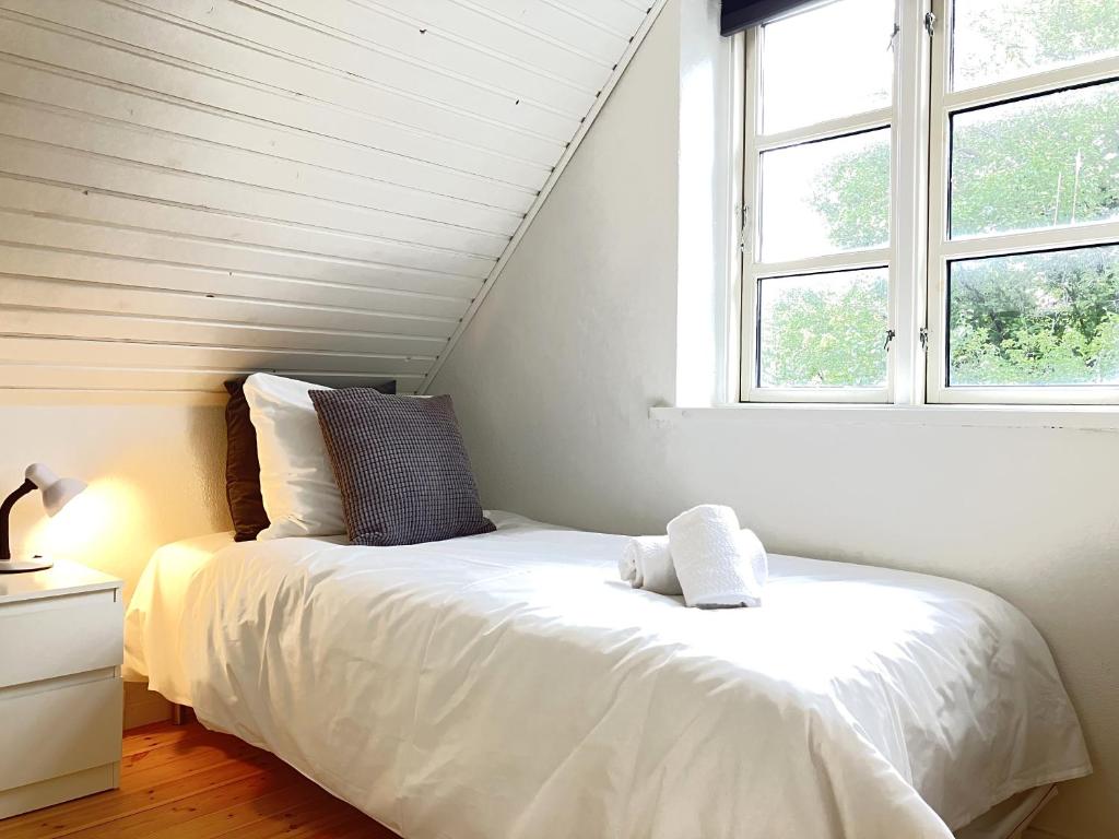 Fotografie z fotogalerie ubytování Lovely Two Story Rowhouse v destinaci Odense