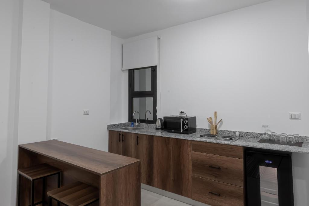 Kuchyň nebo kuchyňský kout v ubytování Sola inn