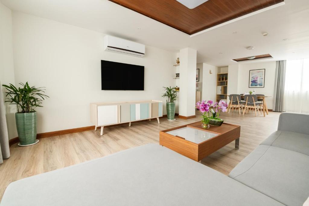 TV a/nebo společenská místnost v ubytování Mila Hotel