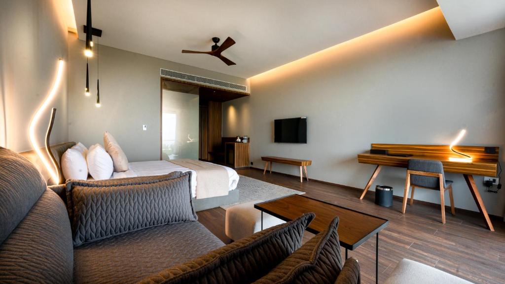 TV a/nebo společenská místnost v ubytování Aria Resort & Spa