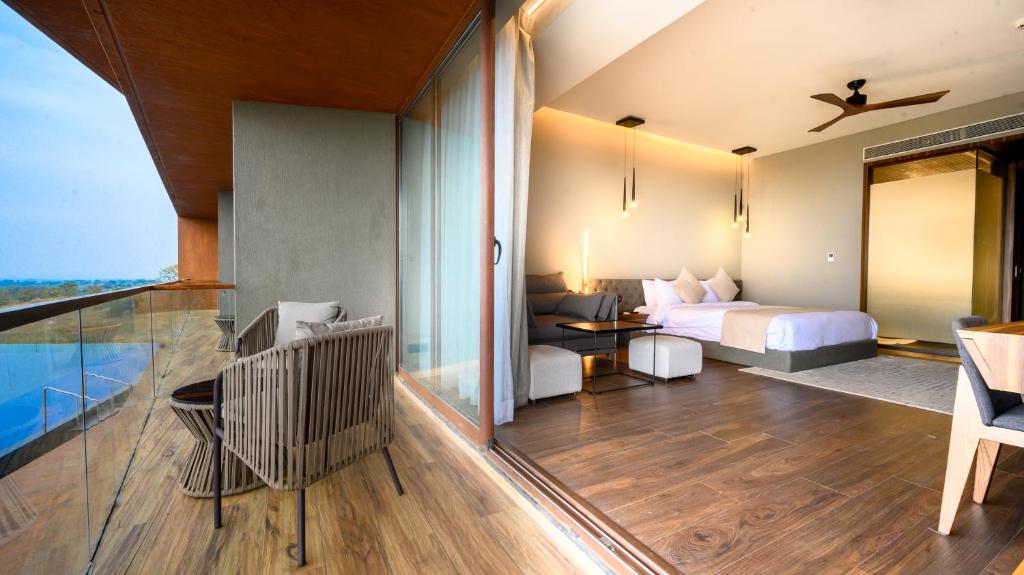 Postel nebo postele na pokoji v ubytování Aria Resort & Spa