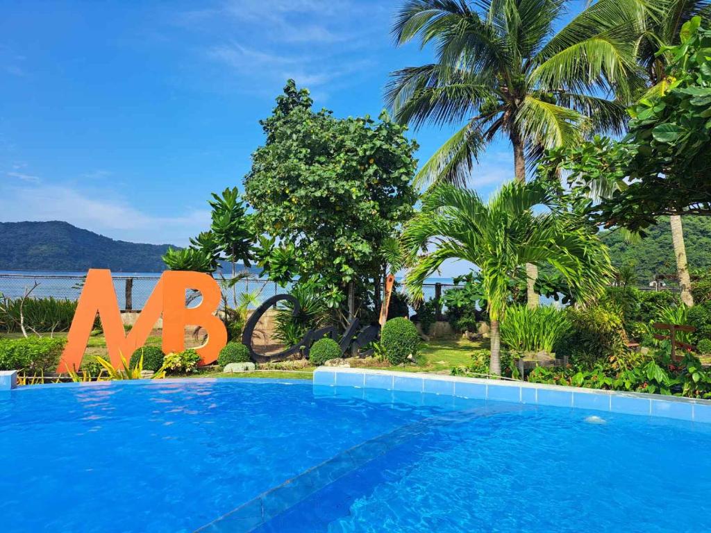 a swimming pool in front of a resort at MB Cove in Nasugbu