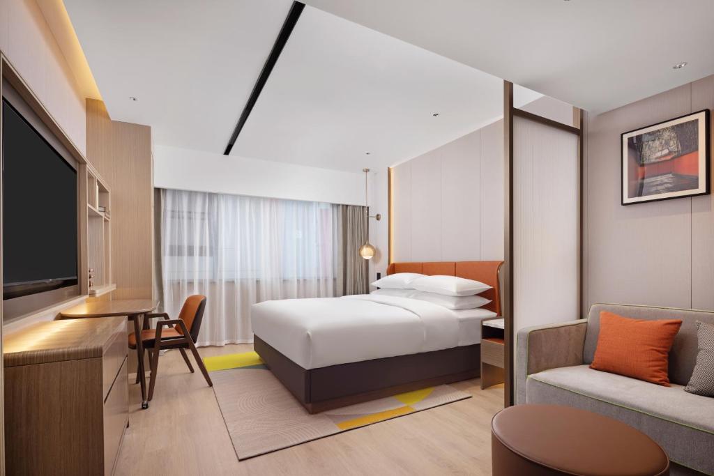Postel nebo postele na pokoji v ubytování Home2 Suites by Hilton Chengdu Kuanzhai Alley