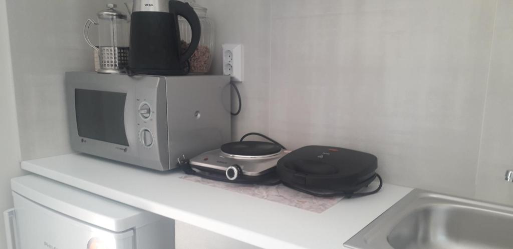 Kuchyň nebo kuchyňský kout v ubytování Lily's studio