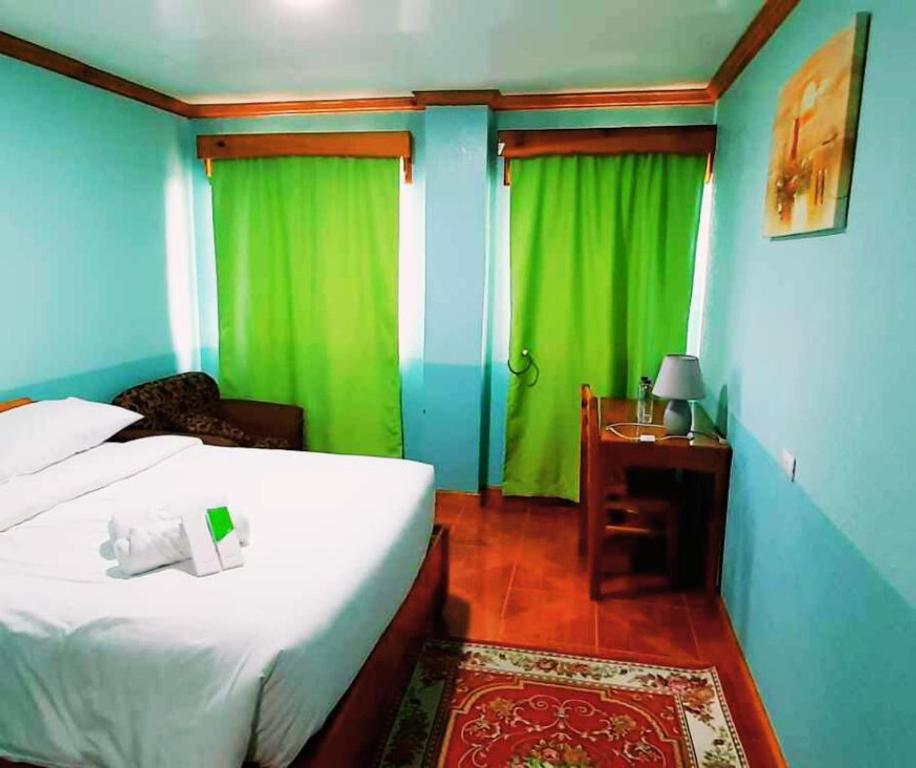 Postel nebo postele na pokoji v ubytování The Lalouette Inn