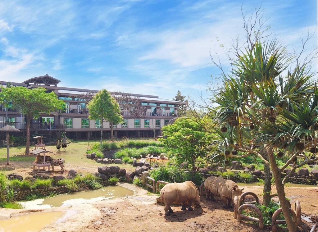 a group of elephants in front of a building at Leofoo Resort Guanshi in Guanxi