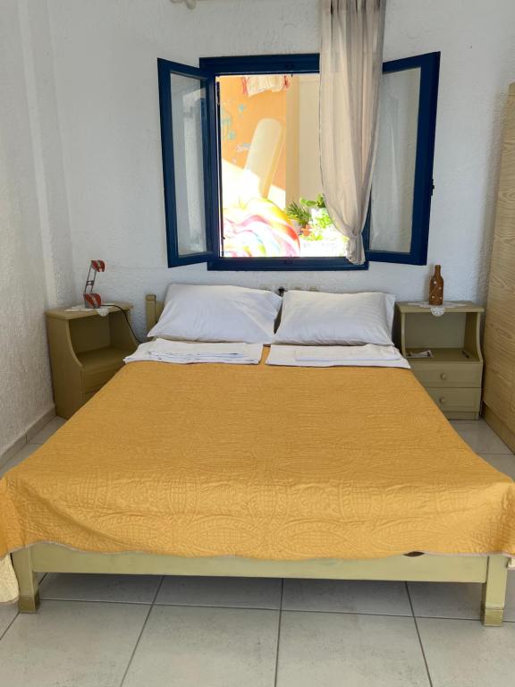 Postel nebo postele na pokoji v ubytování Blue Thea
