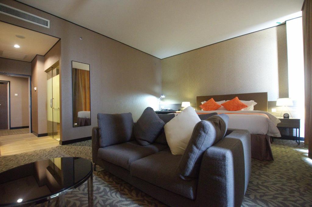 Grand Alora Hotel - Комната Deluxe King Executive