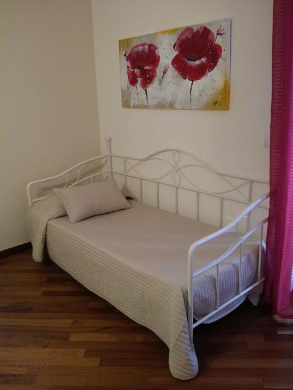 Posteľ alebo postele v izbe v ubytovaní Residenza Piazza Moro