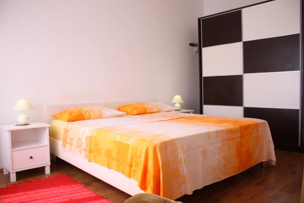 Posteľ alebo postele v izbe v ubytovaní Apartment Sendy