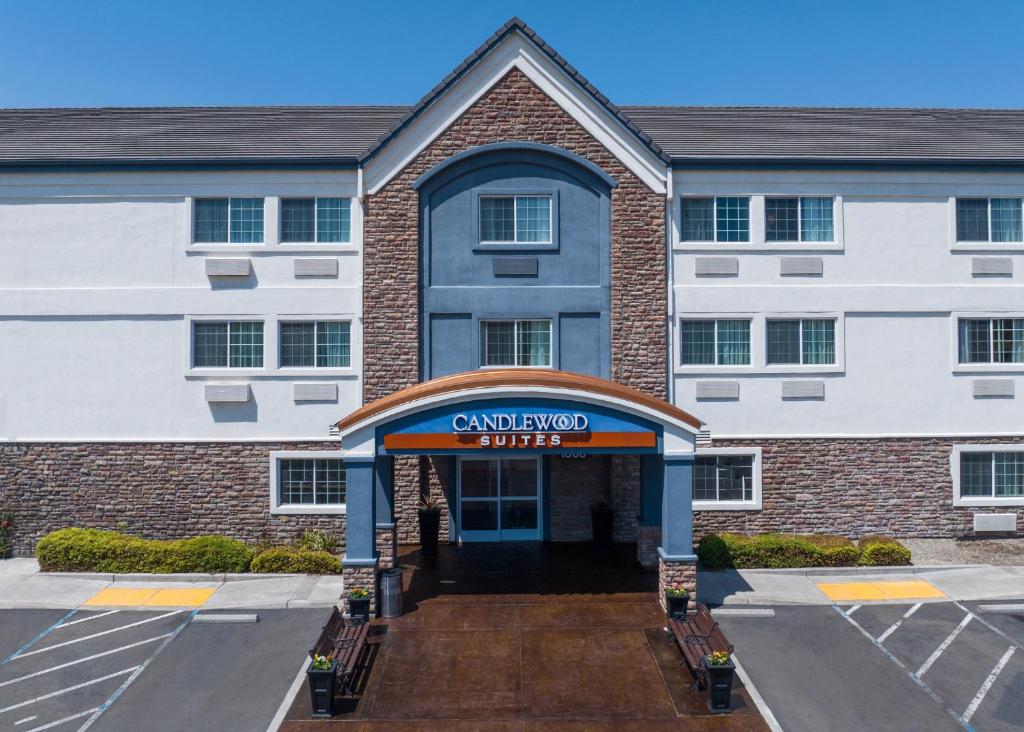 a building with a sign that reads ant respond units at Candlewood Suites Turlock, an IHG Hotel in Turlock