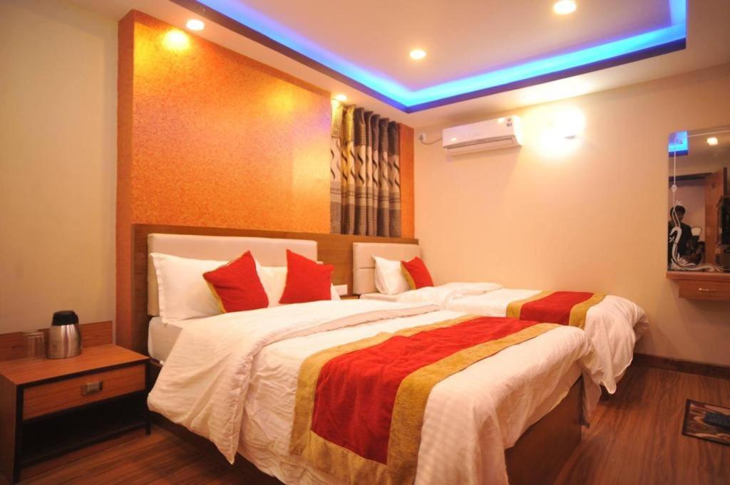 Postel nebo postele na pokoji v ubytování Hotel Arati Pvt. Ltd.