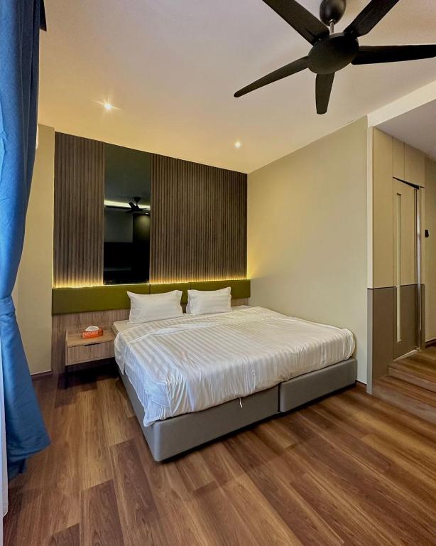Postel nebo postele na pokoji v ubytování I-VISTA HOTEL