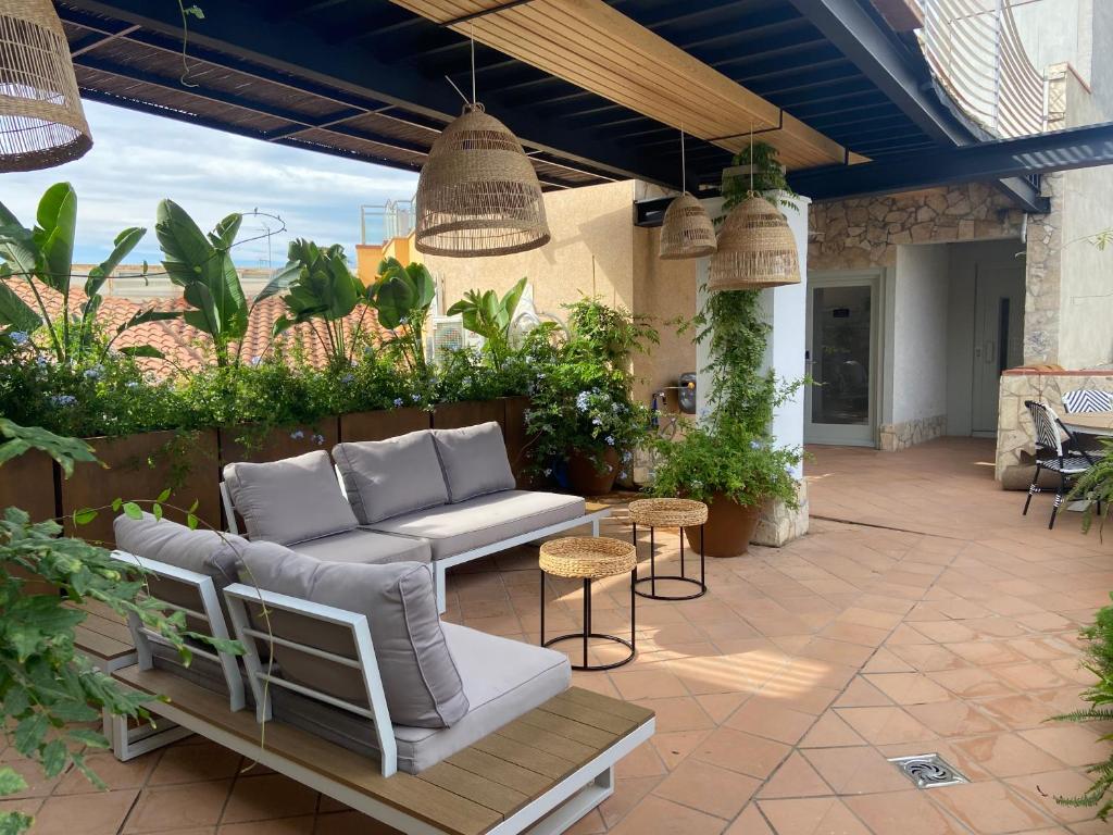Posezení v ubytování Calendula Hotel & Apartaments