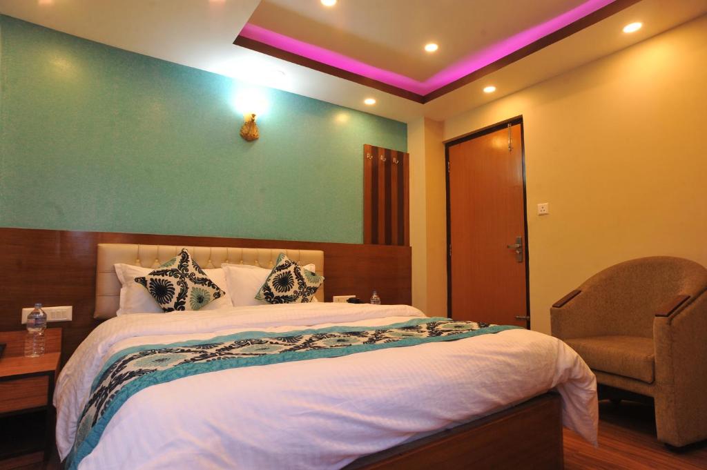 Postel nebo postele na pokoji v ubytování Hotel Arati Pvt. Ltd.
