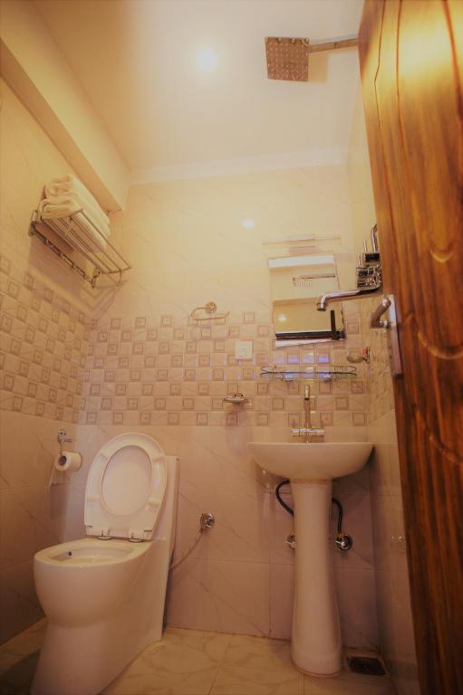 Koupelna v ubytování Hotel Arati Pvt. Ltd.