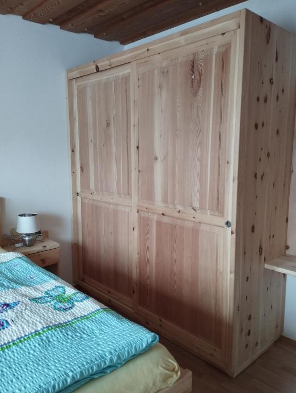 A bed or beds in a room at Apartments Grabler