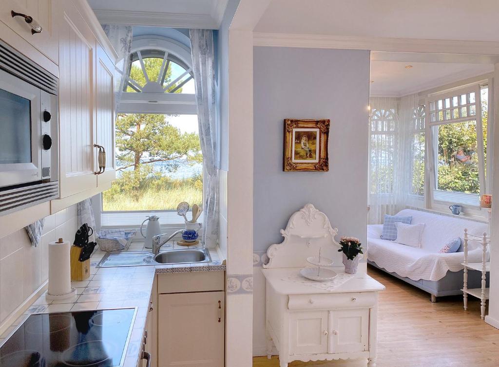 Kuchyň nebo kuchyňský kout v ubytování Villa Hansa am Meer