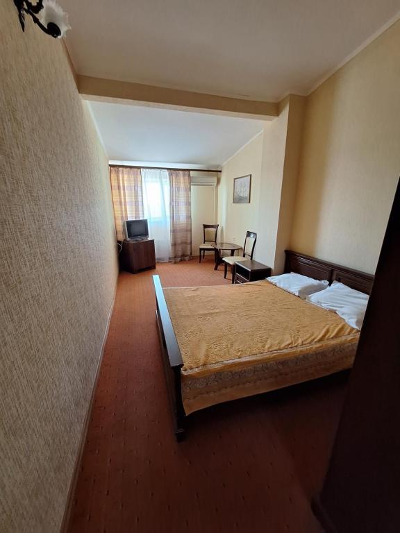 Postel nebo postele na pokoji v ubytování Барселона
