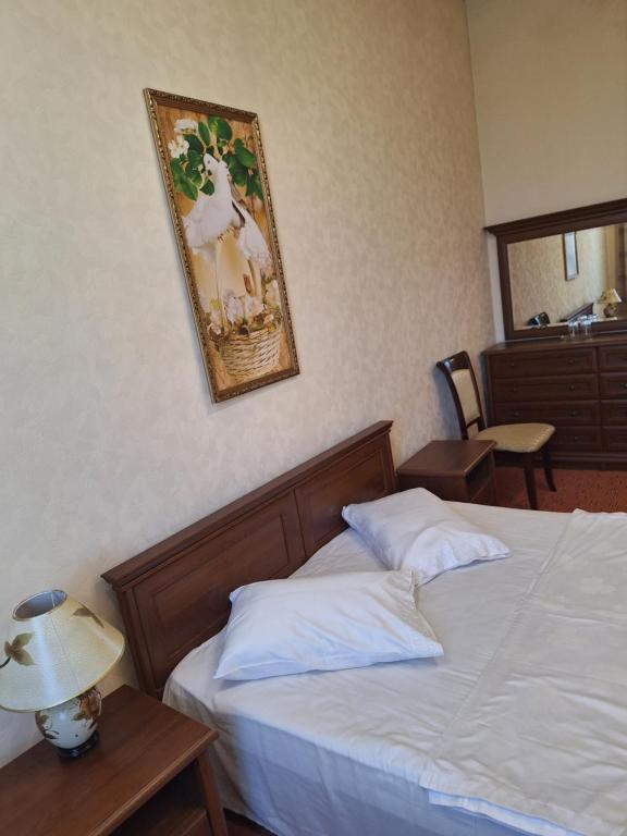 Postel nebo postele na pokoji v ubytování Барселона