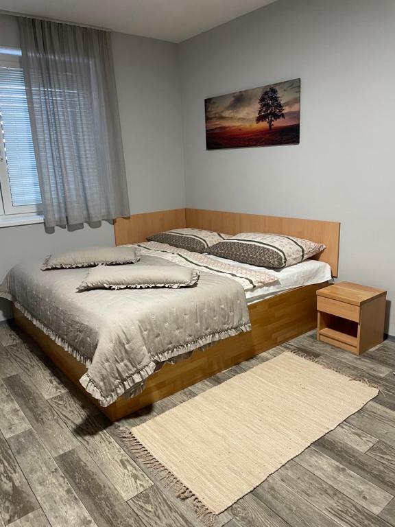 Postel nebo postele na pokoji v ubytování Apartmány Andělská