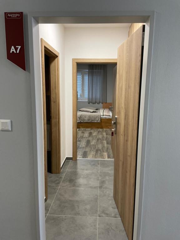 Postel nebo postele na pokoji v ubytování Apartmány Andělská