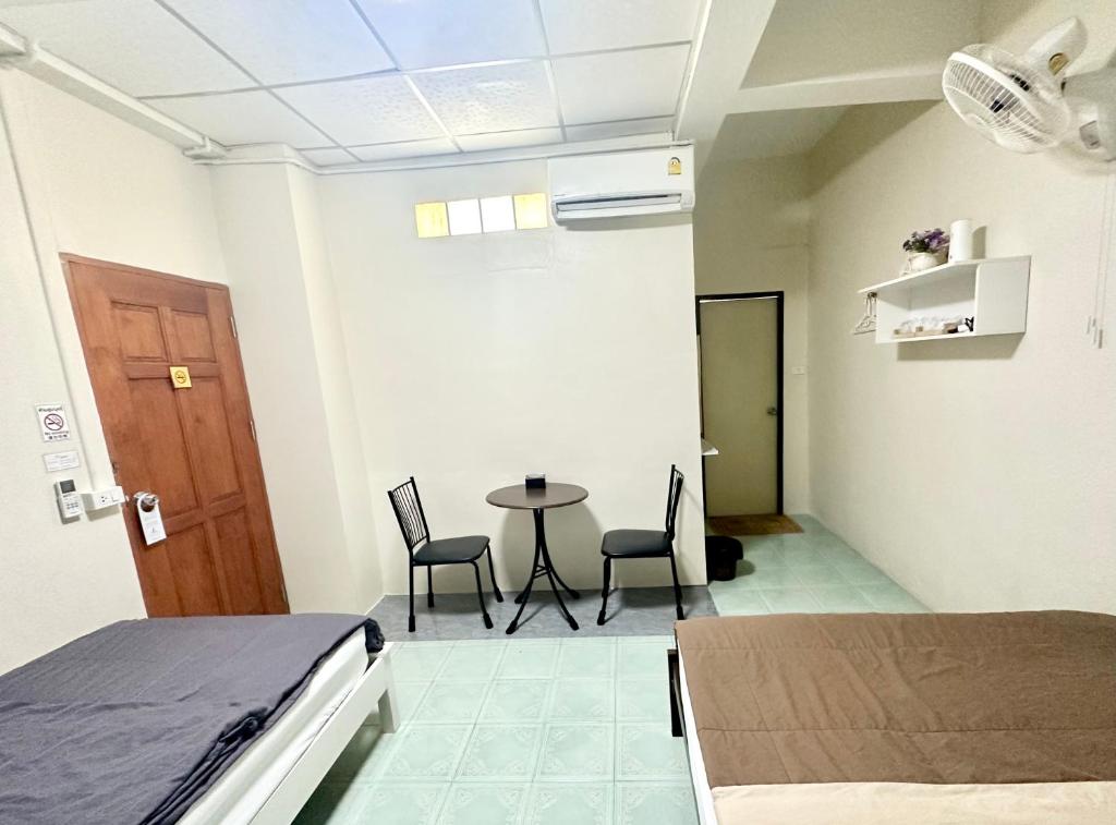 Postel nebo postele na pokoji v ubytování PD Hostel